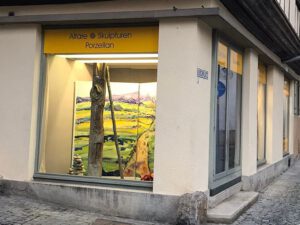 Schaufenster-Ausstellung Camino del arte Restaurator Hub